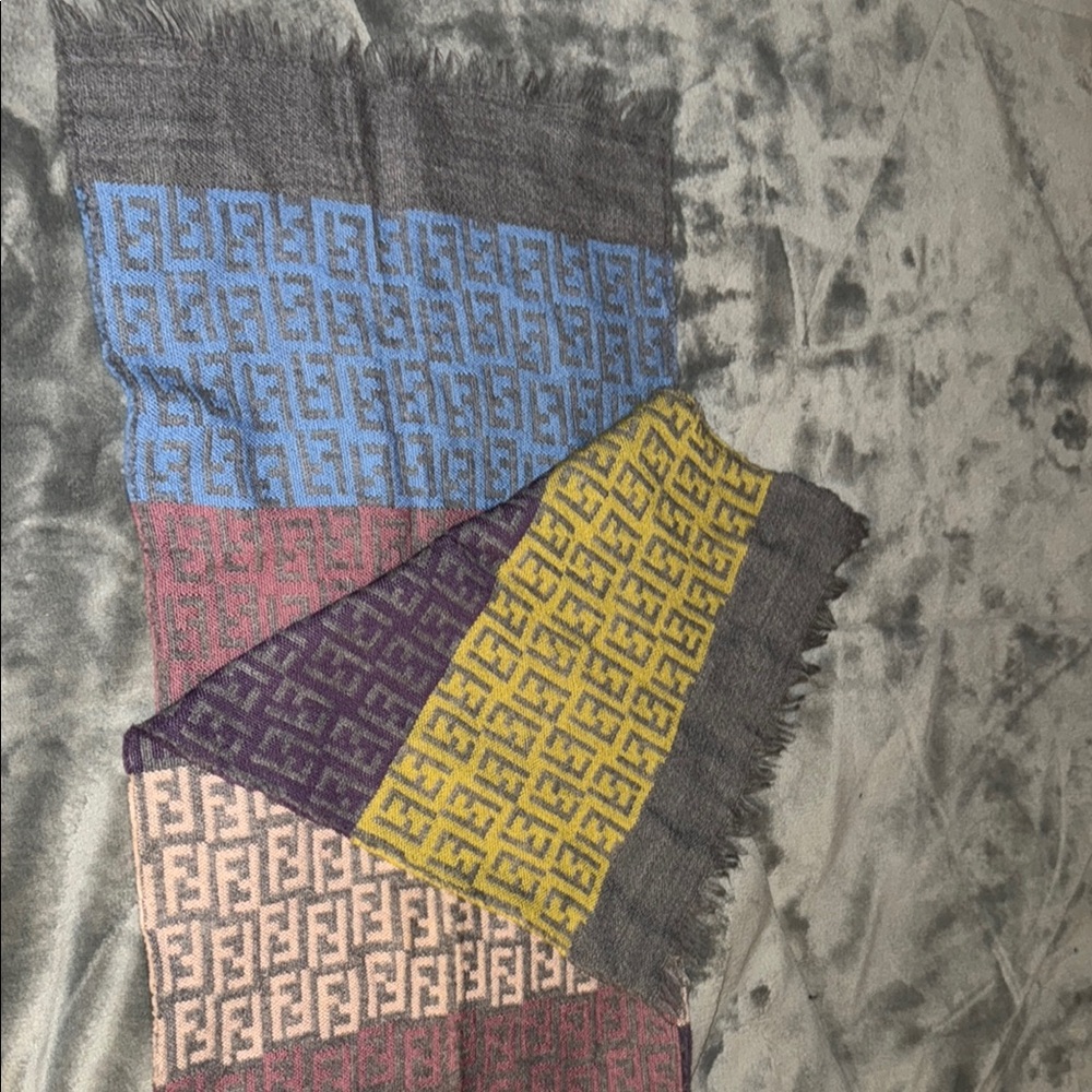 Preloved Fendi scarf multi color great condition size is 64”L X 12.5”W.